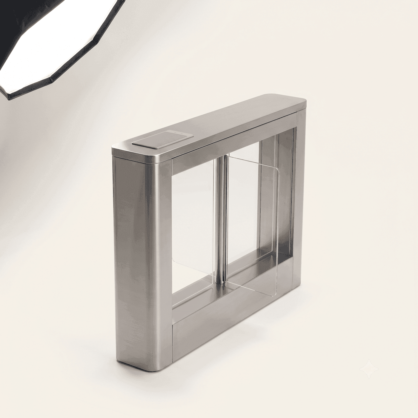 Single-lane stainless steel speed gate with retractable acrylic flaps and a recessed reader pad