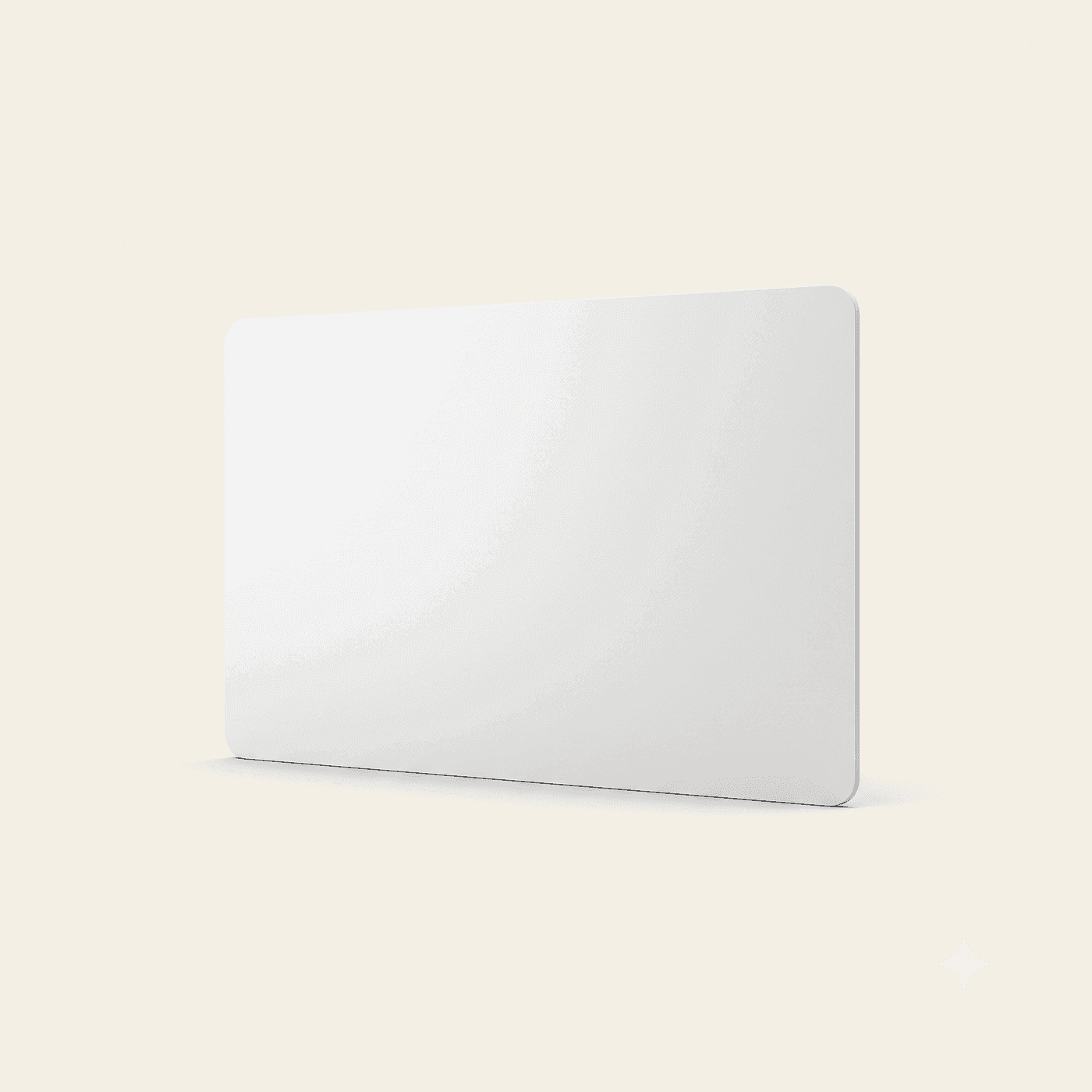 Blank white contactless smart card, credit-card size, propped at an angle