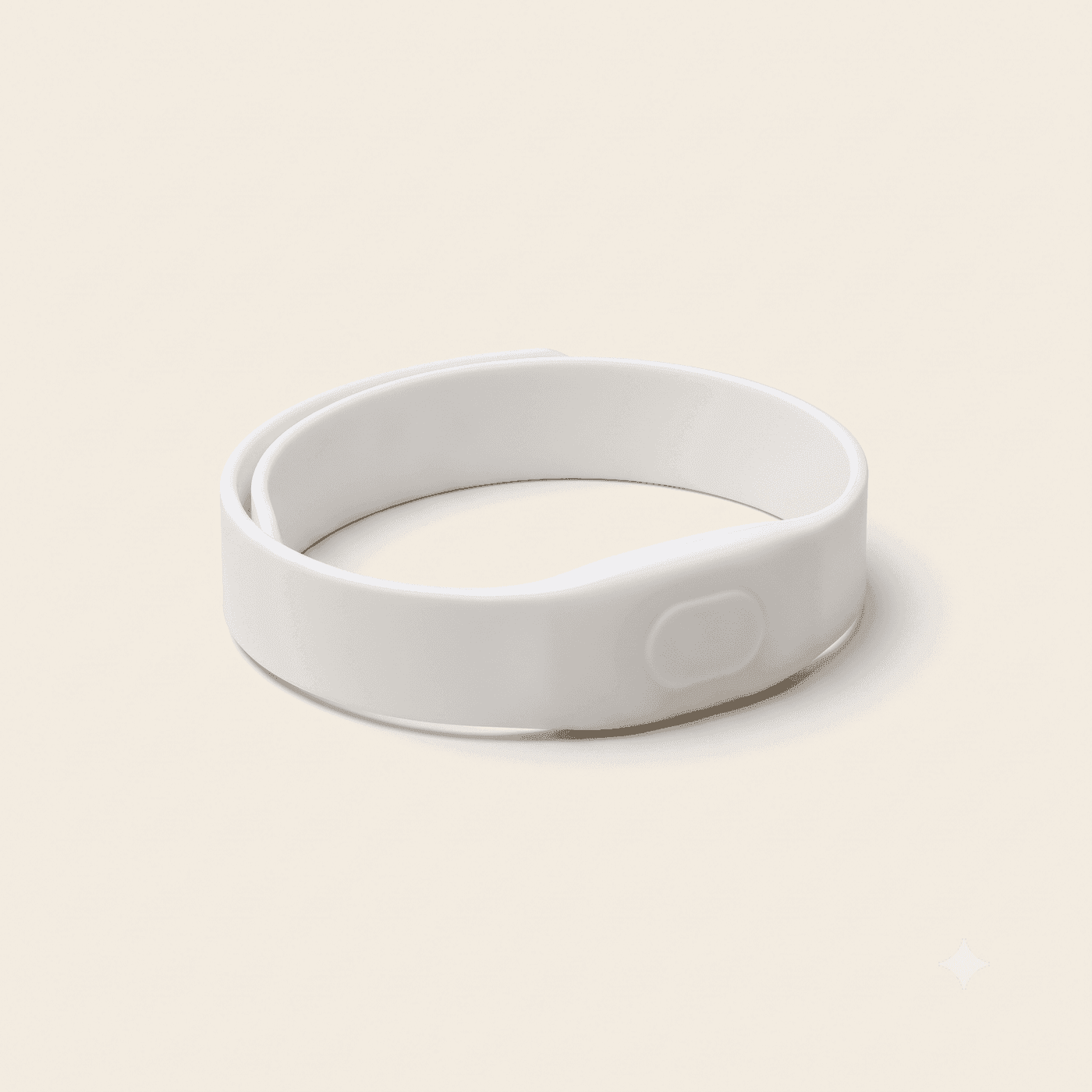 Plain white medical patient wristband closed into a loop, with an embedded NFC chip module